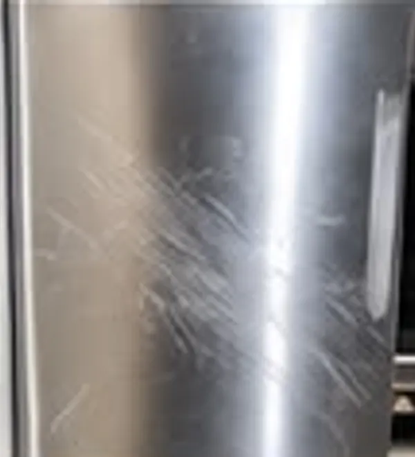 Stainless appliance, factory finish restored before